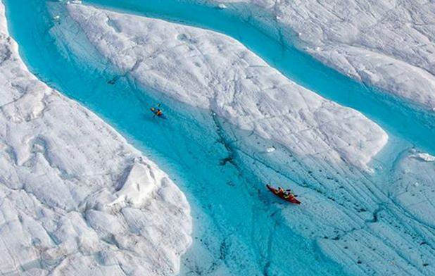 Kayaking in Crystal Clear Blue River in Greenland