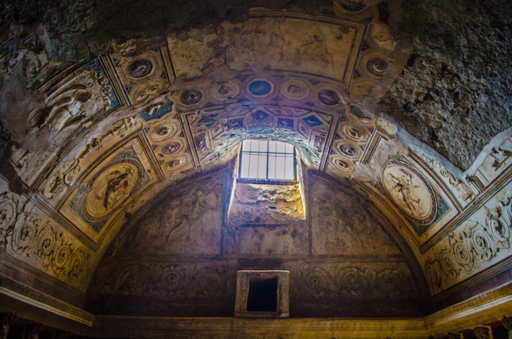 hole in the ceiling of an ancient spa in the complex of pompeii city ruins near naples.