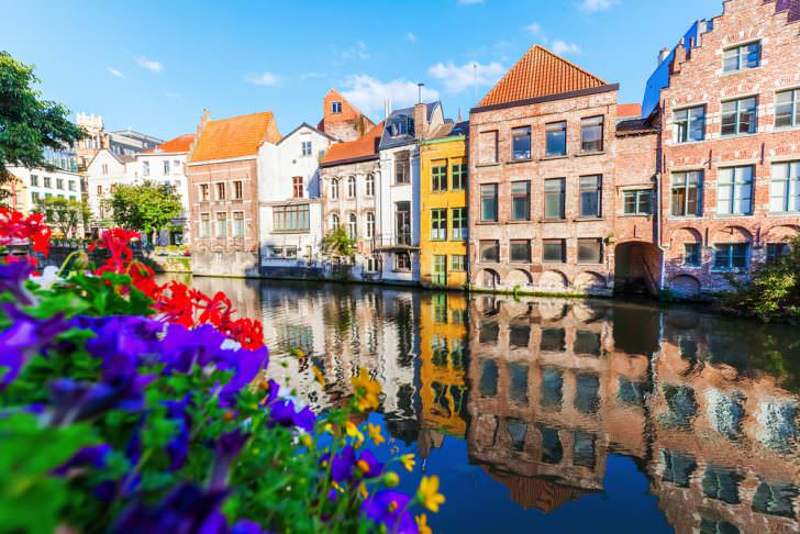 Old buildings along a canal in Ghent, Belgium