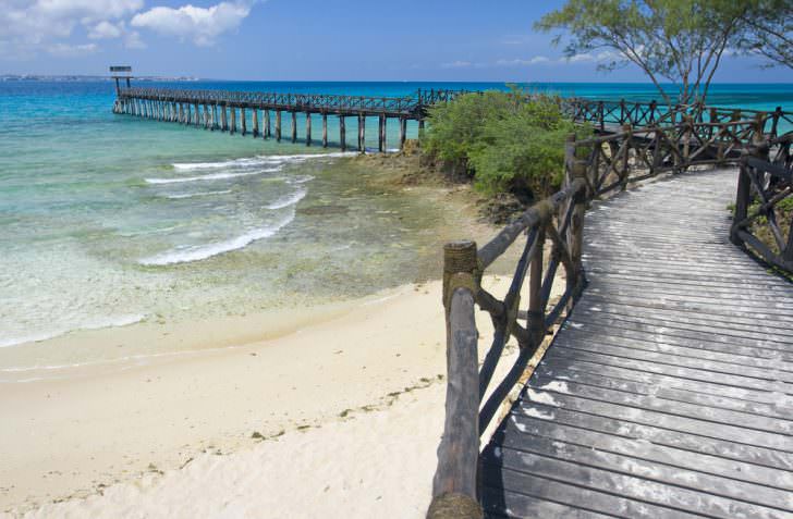 A part of beach with wooden mole on Prison island, Zanzibar