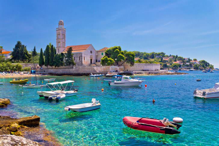 Turquoise sea of Hvar island, franciscian monastery view in Dalmatia, Croatia
