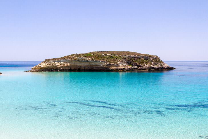 https://www.pandotrip.com/wp-content/uploads/2017/02/Lampedusa-Italy-Pure-crystalline-water-surface-around-an-island-Lampedusa3-728x486.jpg