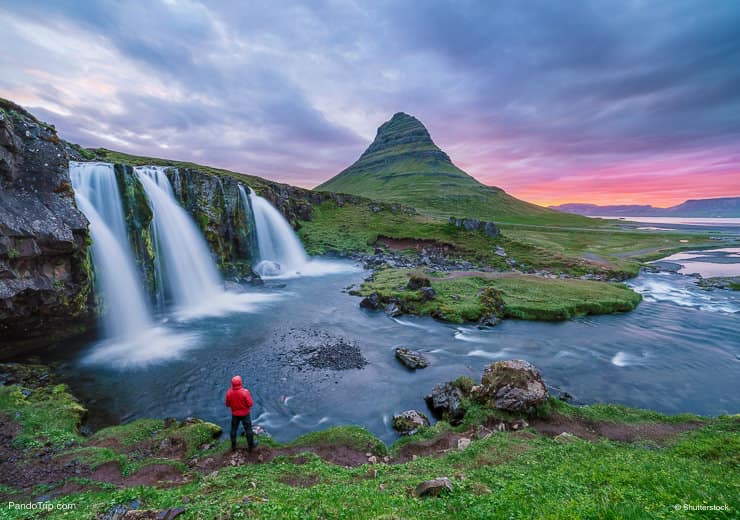 Kirkjufellsfoss waterfall and Kirkjufell mountain in Iceland