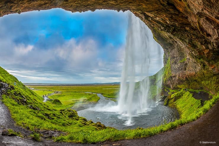 Passage under Seljalandsfoss waterfall