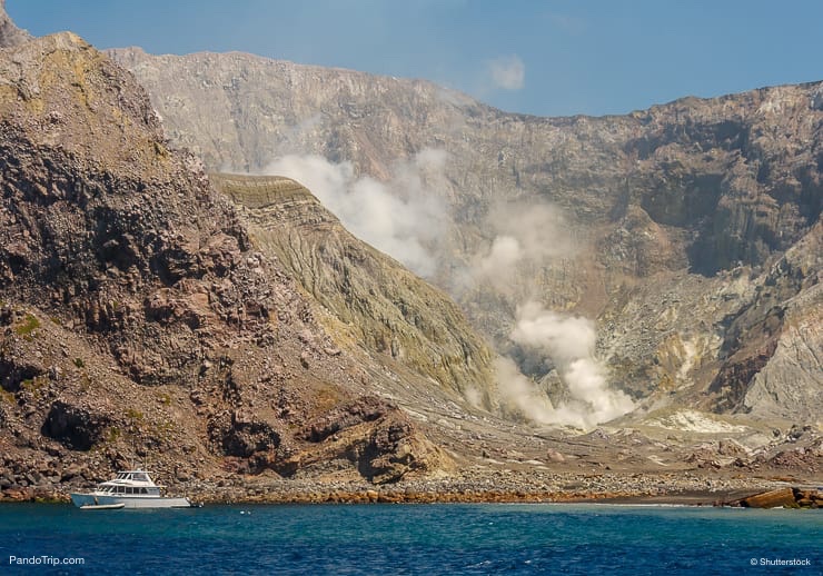 Yacht moored at Whakaari or White Island in New Zealand