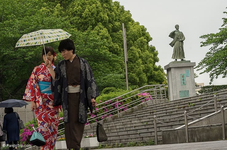 A couple walking at Sumida Park