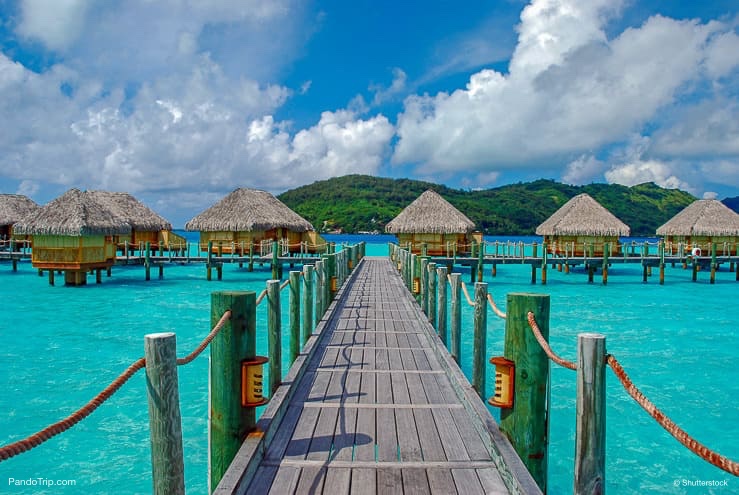 The bridge to over water bungalows in Bora Bora, French Polynesia, Pacific Ocean