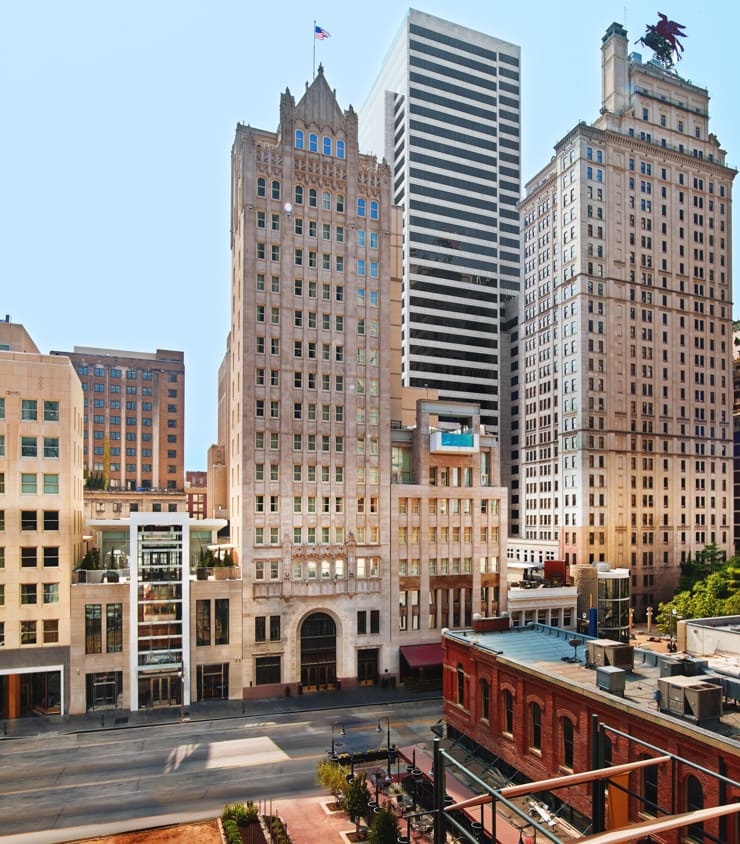 The Joule Hotel in Dallas with a glass-wall swimming pool overhanging the street