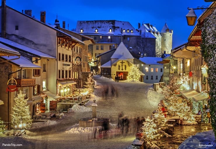 Christmas night scene in the medieval town of Gruyeres, Switzerland