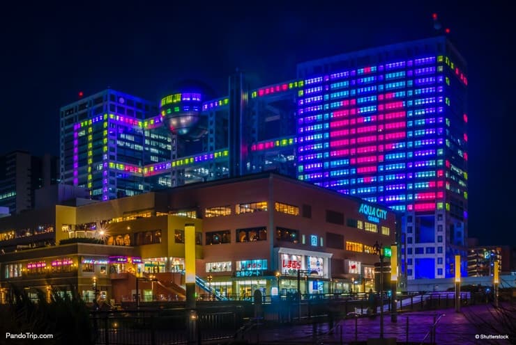 Fuji TV Building Light Show at night. Odaiba, Tokyo, Japan