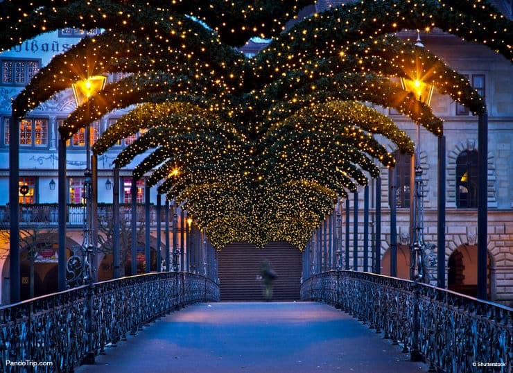 The Rathaussteg, a footbridge over Reuss river, illuminated during Christmas time in Lucerne, Switzerland