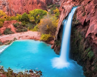 Swim under the Havasu Falls in the Grand Canyon, USA