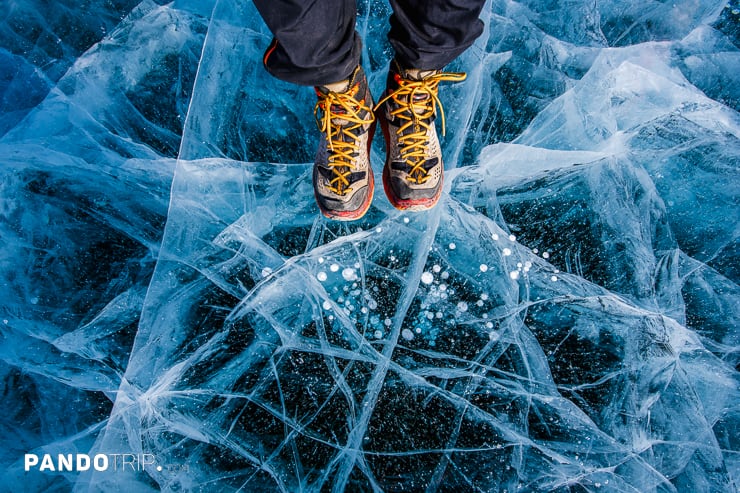 Feet on frozen Lake Baikal