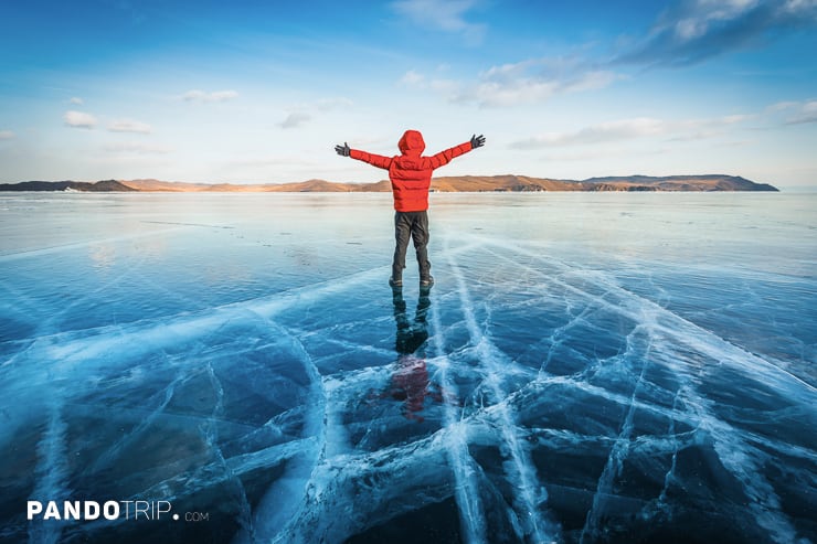 Man walking on ice on Lake Baikal