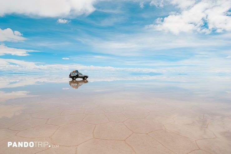 Car on the Salar de Uyuni in Bolivia