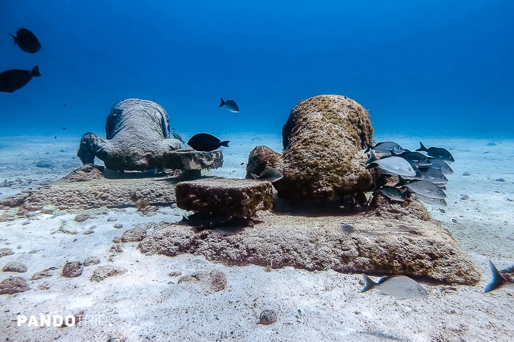 The Bankers by Jason deCaire Taylor at Cancun Underwater Museum of Art