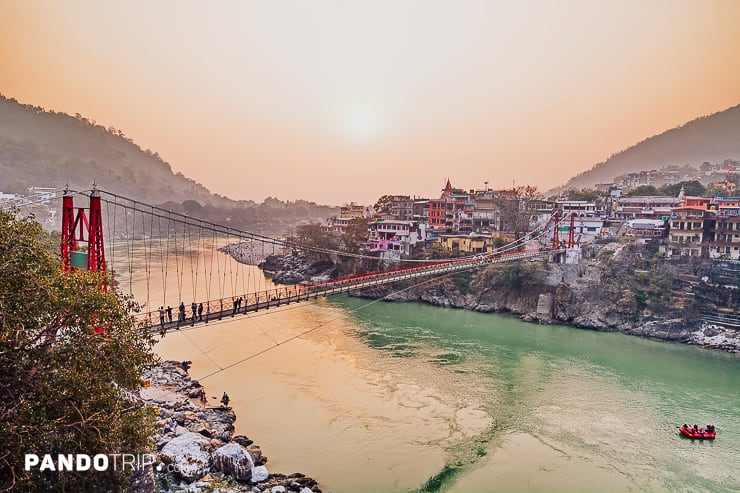 Lakshman Jhula suspension bridge over Ganges river in Rishikesh