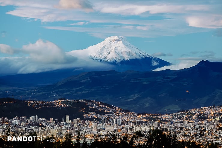 Sunrise in Quito city with Cotopaxi volcano