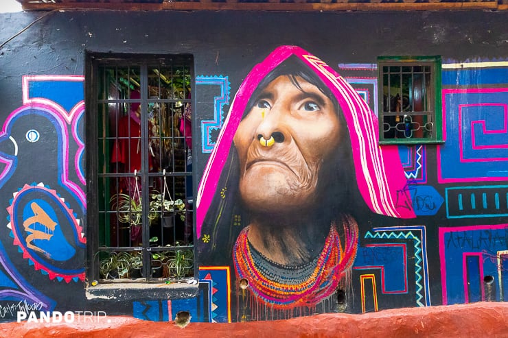 Home facade with mural in La Candelaria district, Bogota