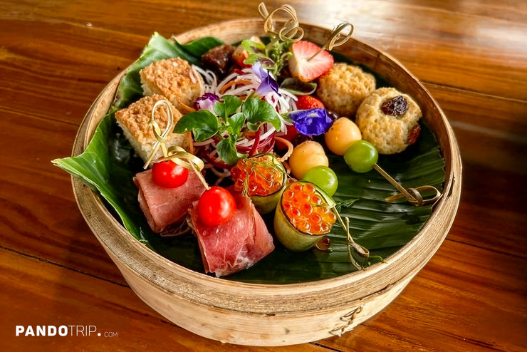Close up of wooden bow with food at Bird’s Nest Restaurant