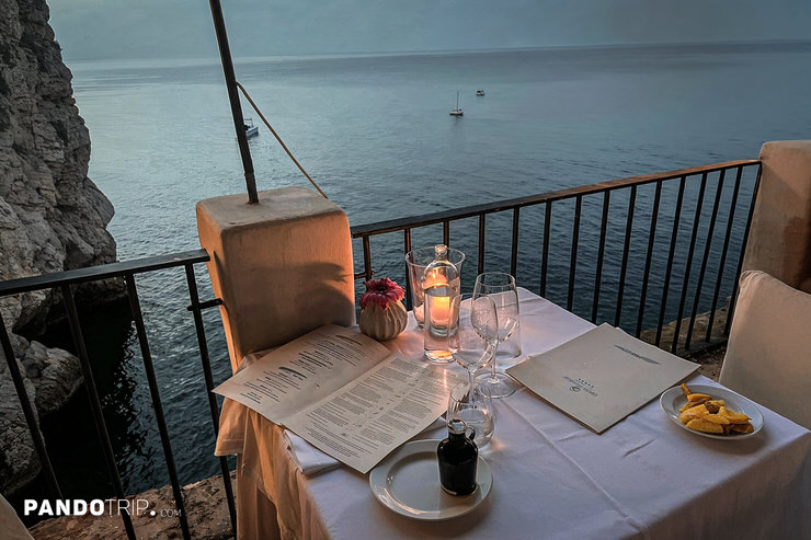 Table setting at Grotta Palazzese, an Italian restaurant in a cave overlooking the sea