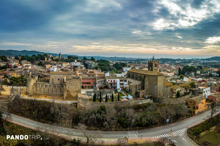 Aerial view of medieval Calonge with Calonge Castle and the Church of Sant Martí