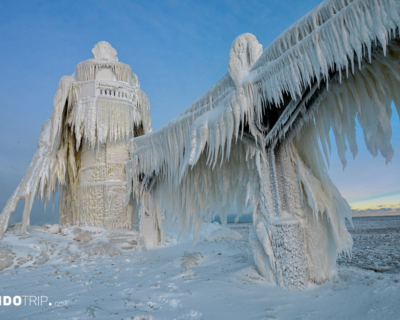 Frozen St. Joseph North Pier on Lake Michigan, USA