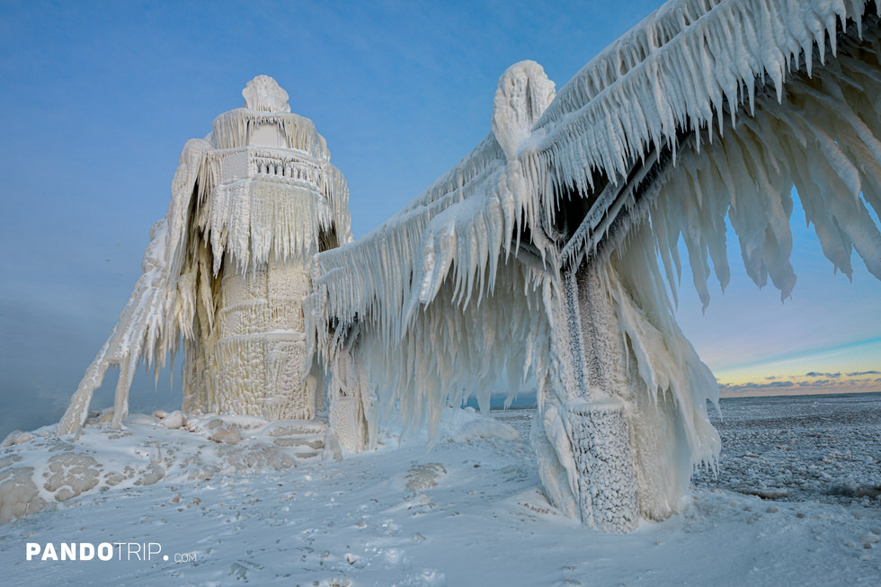 Frozen St. Joseph North Pier on Lake Michigan, USA