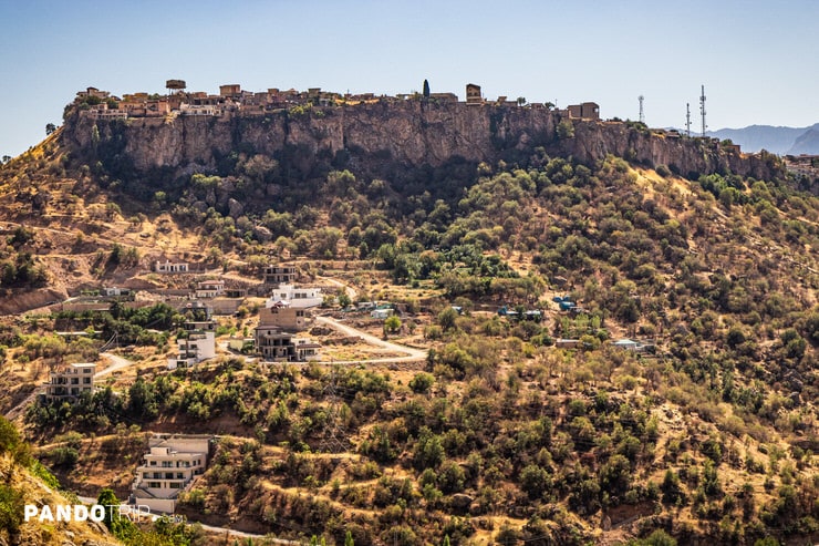 Elevated view of Amedi town built atop a steep rocky plateau in Kurdistan, Iraq