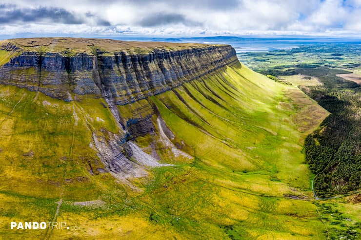 Wide aerial panorama of Benbulbin plateau with views stretching toward the Atlantic Ocean