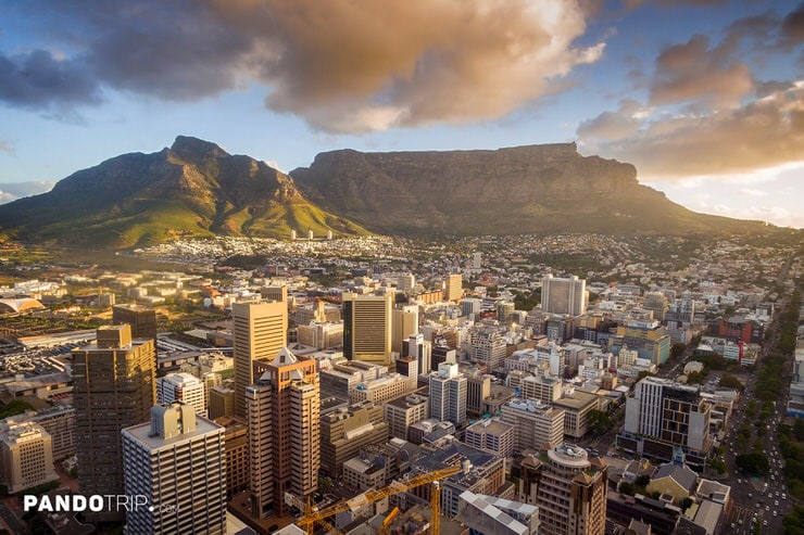 Iconic Table Mountain rising above the skyline of Cape Town, South Africa, during golden hour