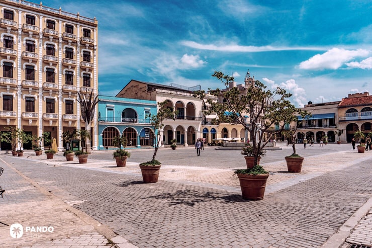 View of Plaza Vieja square with colorful colonial buildings in Old Havana, Cuba