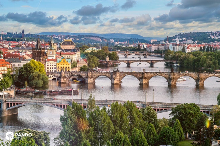View of Prague’s historic bridges including Charles Bridge stretching across the Vltava River
