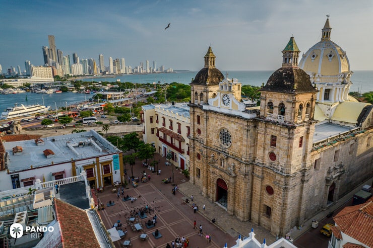 Stone facade and twin towers of San Pedro Claver Church overlooking the bay in Cartagena, Colombia