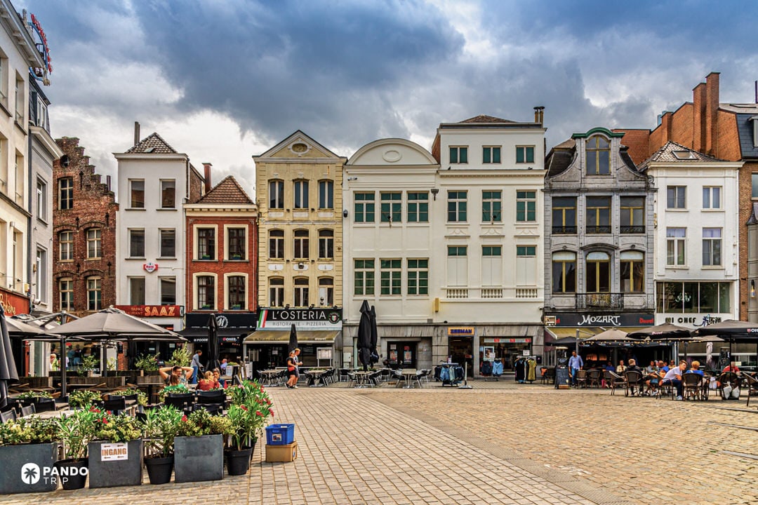Kortrijk’s Grote Markt with café terraces and narrow historic façades