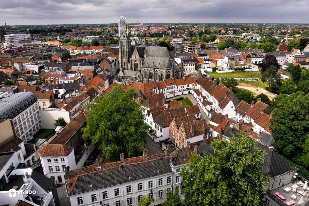 Aerial of Kortrijk historic centre with Saint-Martin’s Church above red-tiled roofs