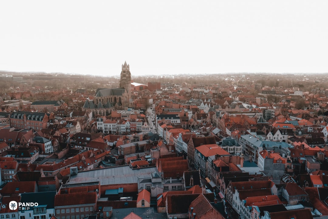 Aerial view of Bruges with the Church of Our Lady tower dominating the medieval skyline