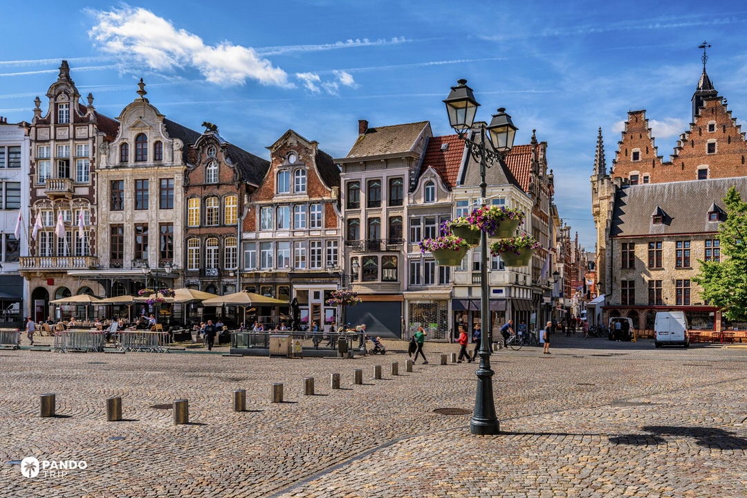 Grote Markt square in Mechelen with Flemish gabled houses and café terraces
