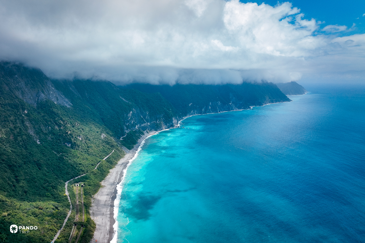 The Qingshui Cliffs running north along the Hualien coast under a low bank of cloud.