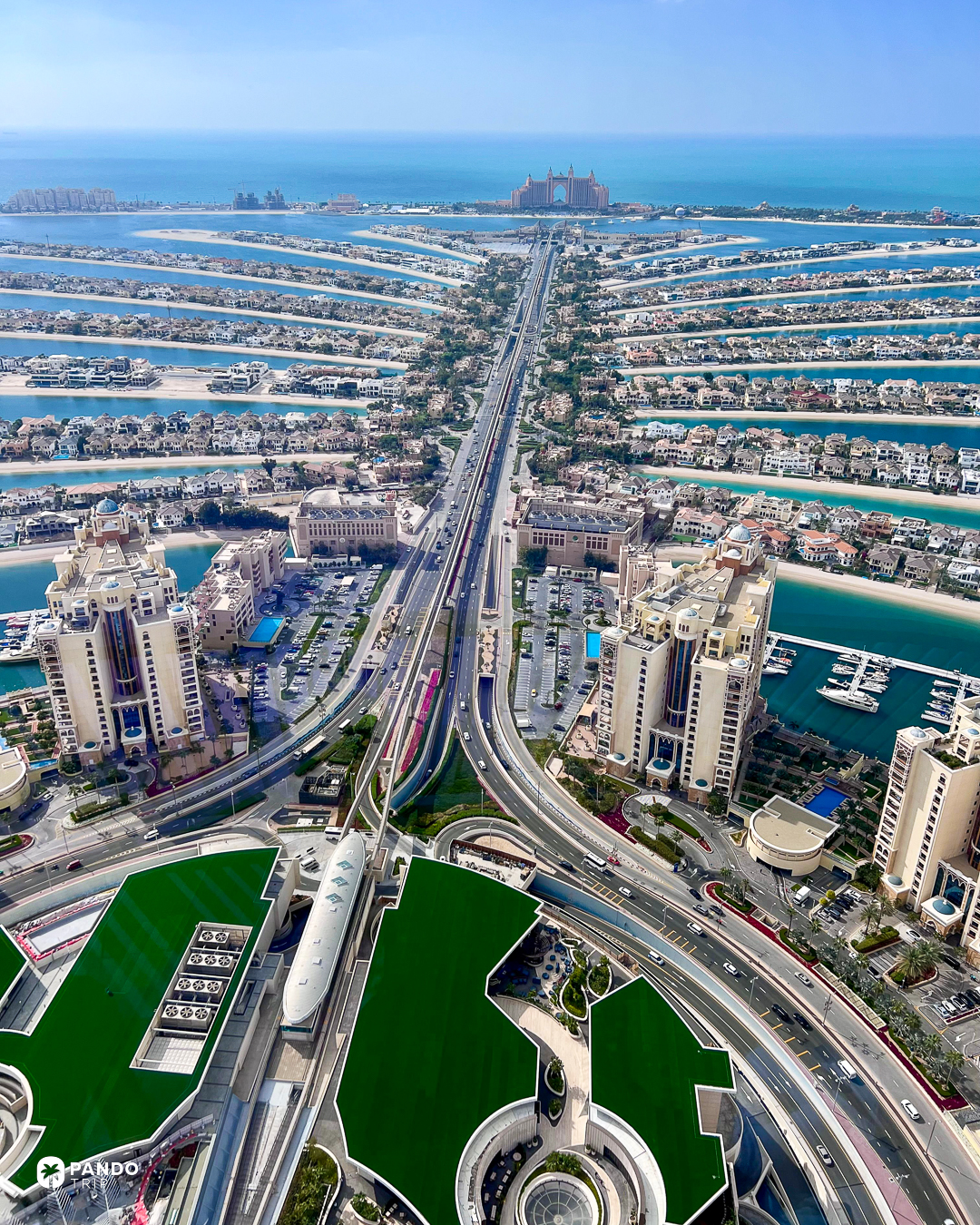 Palm Jumeirah's trunk road and fronds seen from the observation deck at the top of the Palm Tower.
