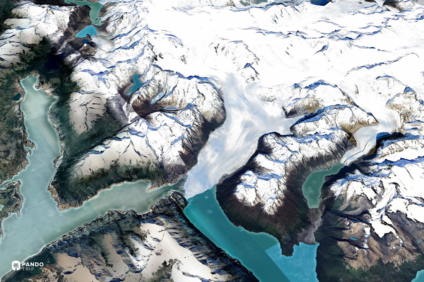 Satellite view of the Perito Moreno glacier crossing Lago Argentino between snow-covered peaks.