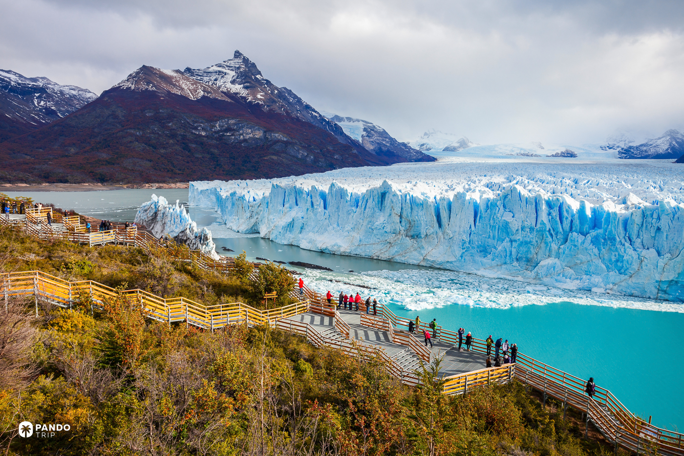 Visitors on the walkways facing the ice wall of the Perito Moreno glacier in Argentina.